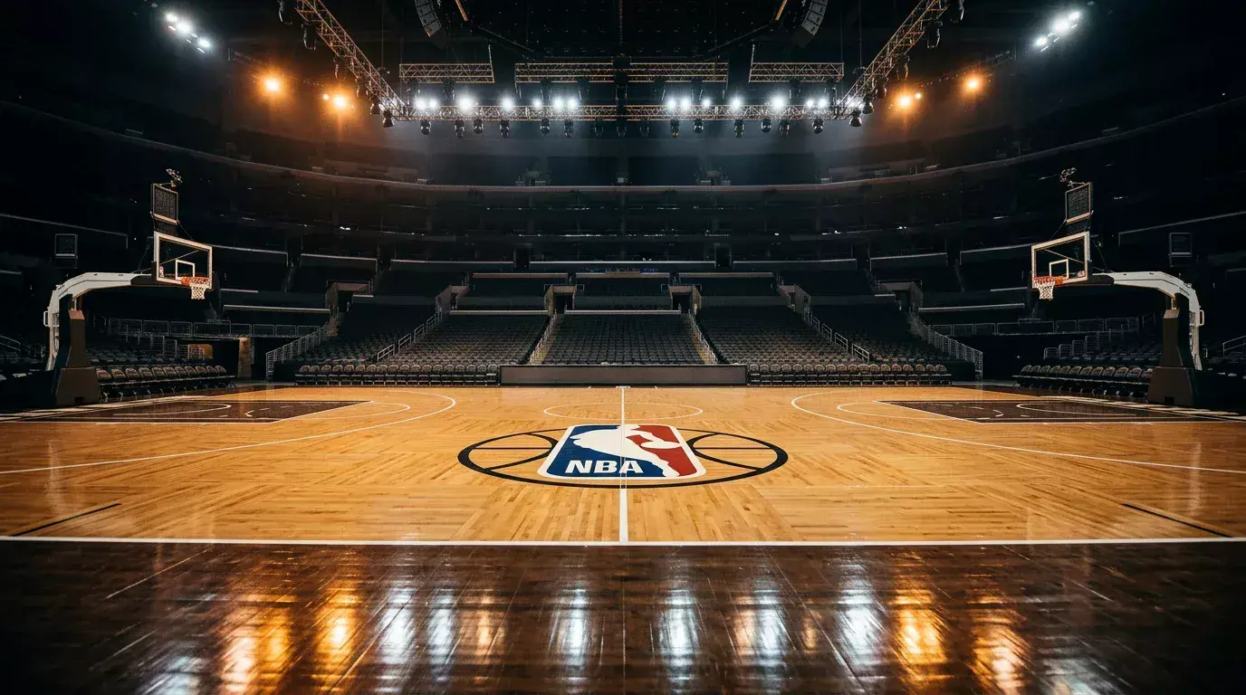 Basketball court with scoreboard showing point spread data