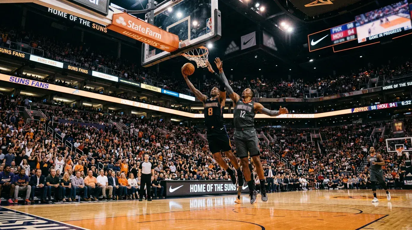 NBA basketball game in progress with players contesting a rebound under the basket